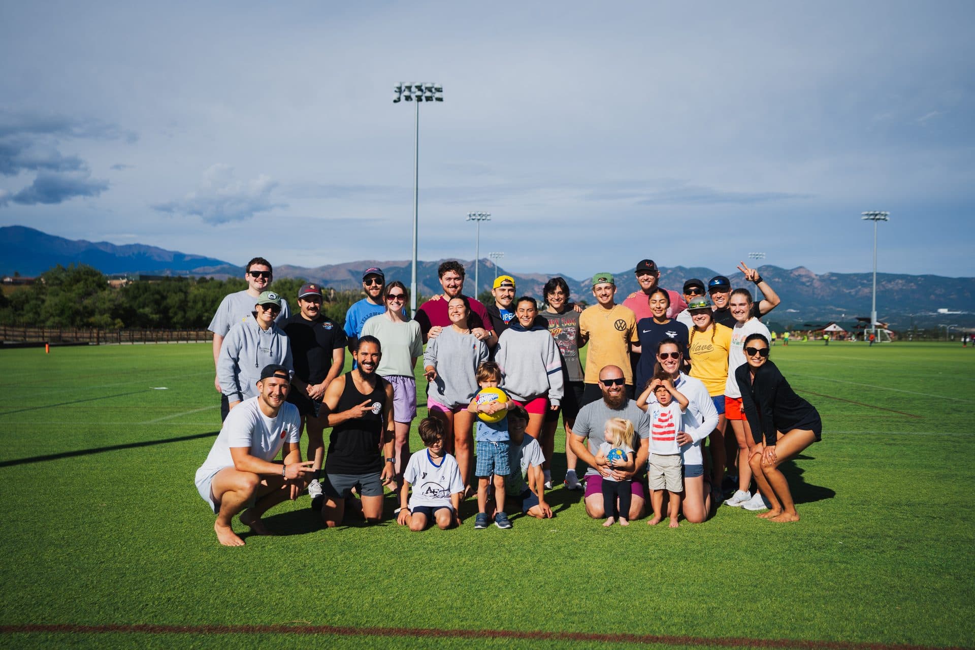 Elevate members playing kickball